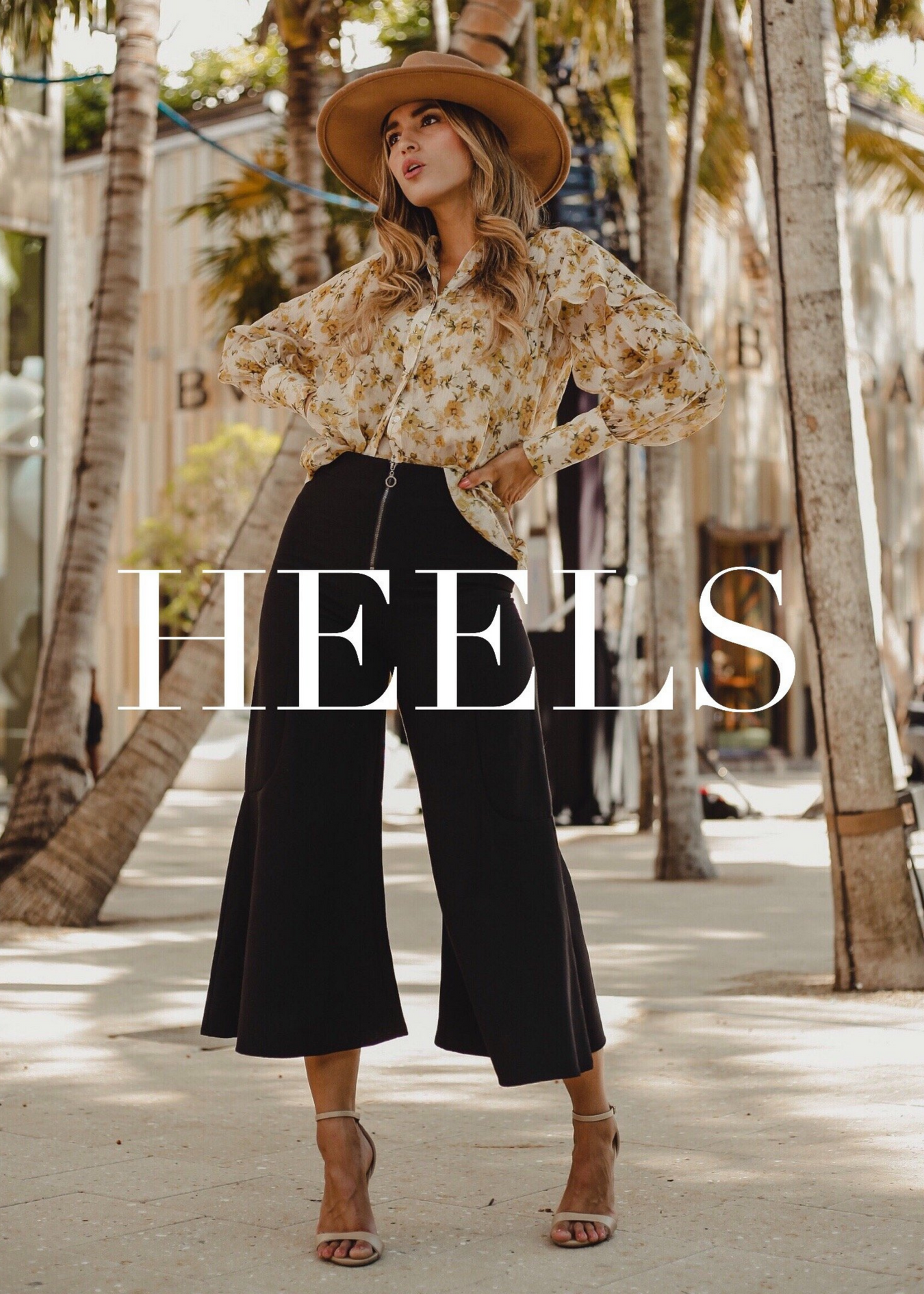 Our heels collection that consists of work heels, classic heels, clear heels, lace-up heels and formal heels. Women wearing work clothing with our nude colored heels, Ali heel which is a comfortable heel that is timeless heel.