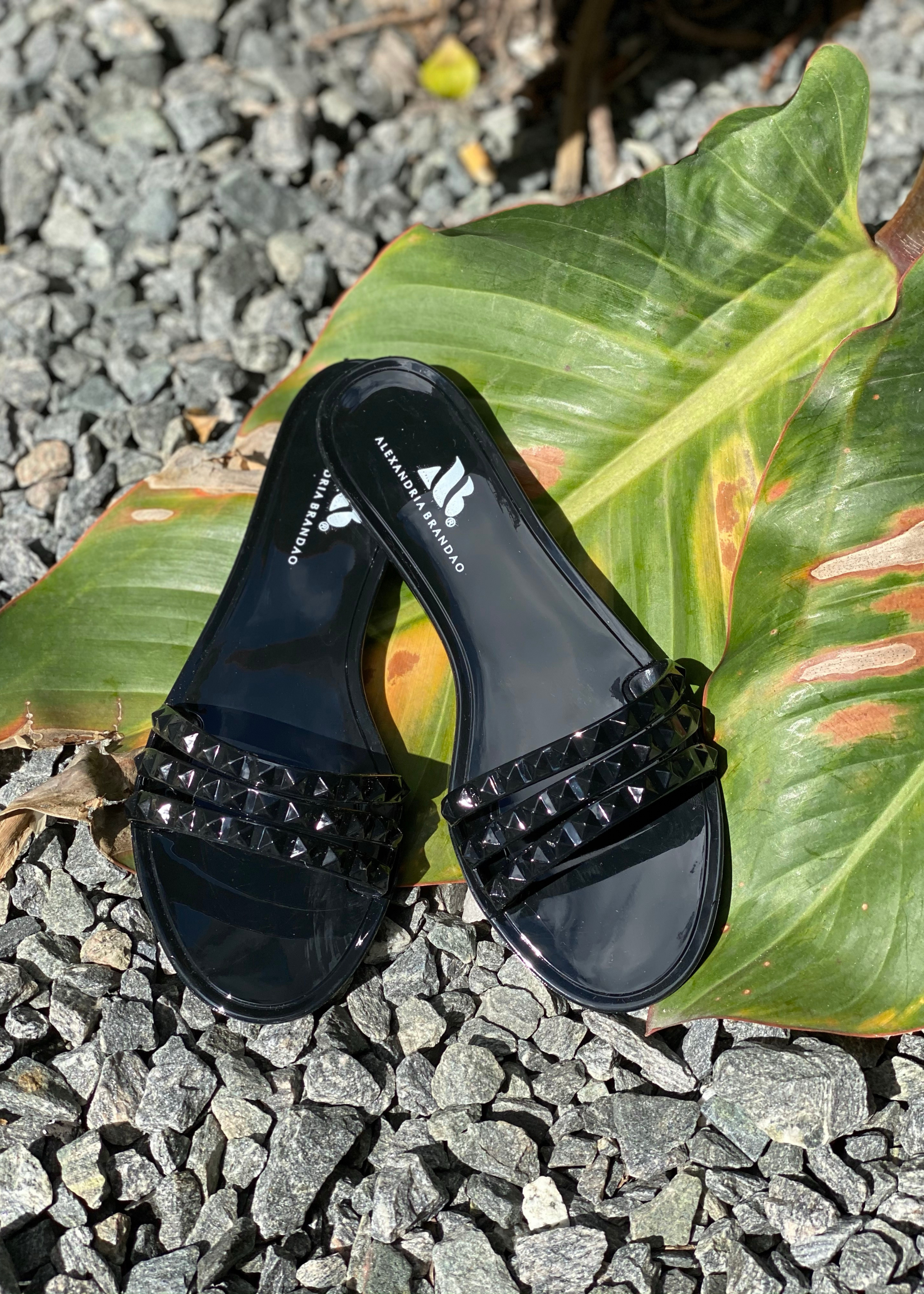 Women's Aria B black waterproof slide on jelly sandals by Alexandria Brandao
