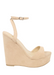 Nude suede ALYSSA wedge with crisscross strap that crosses in the back as the buckle buckles in the side that is silver. Thick to thin back to thick strap in the front.