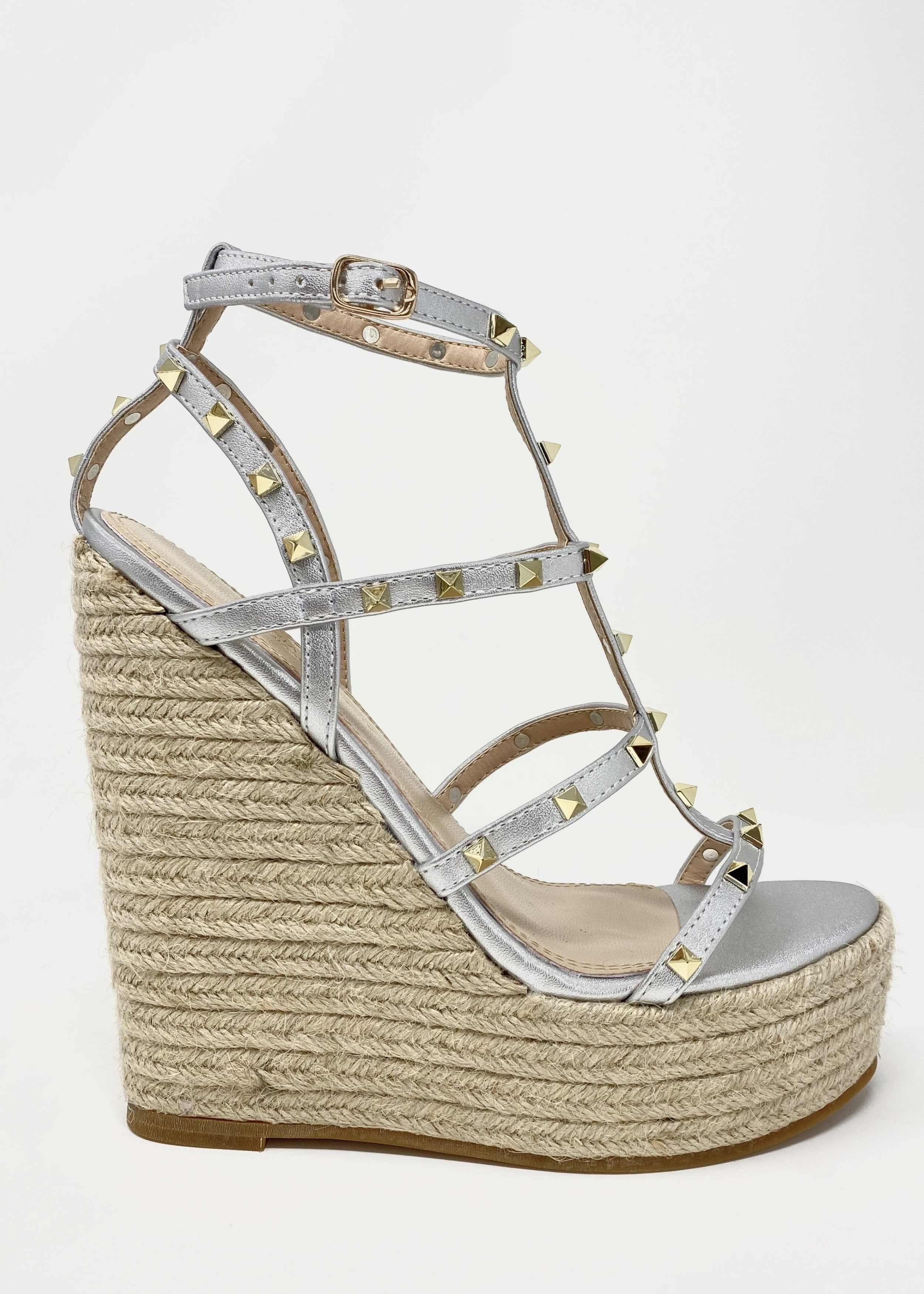 Astrid Espadrille Wedges in Silver that has a espadrille wedge and multi strap gold studded wedge.
