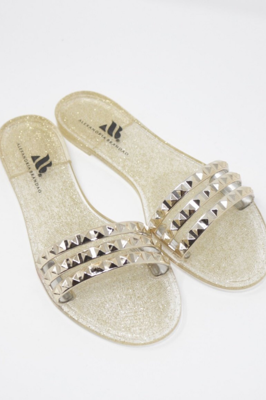 shoes by Alexandria Brandao women's fashion jelly waterproof summer sandal in light gold. slip on travel beach sandal and flip flop