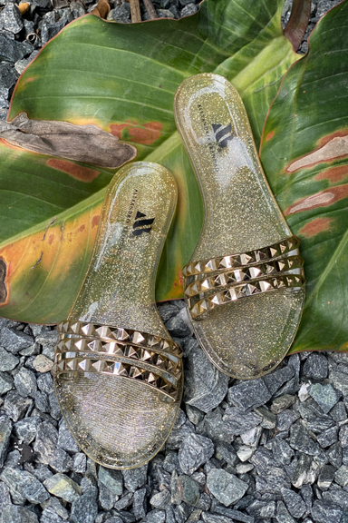 light gold summer sandal and summer fashion flip flop by shoes by Alexandria Brandao. stud strap lightweight travel sandal.