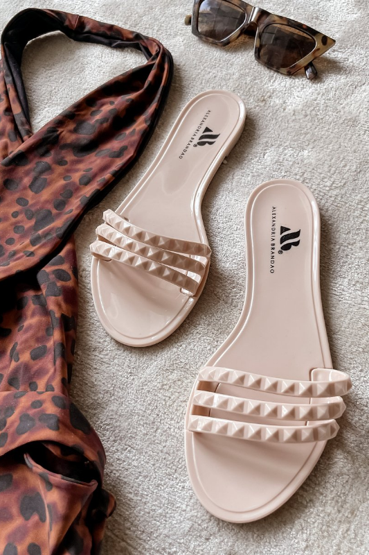 Women's Aria B nude waterproof slide on jelly sandals by Alexandria Brandao