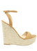 Camel suede ALYSSA wedge with espadrille wedge that crisscross strap that crosses in the back as the buckle buckles in the side that is silver. Thick to thin back to thick strap in the front.