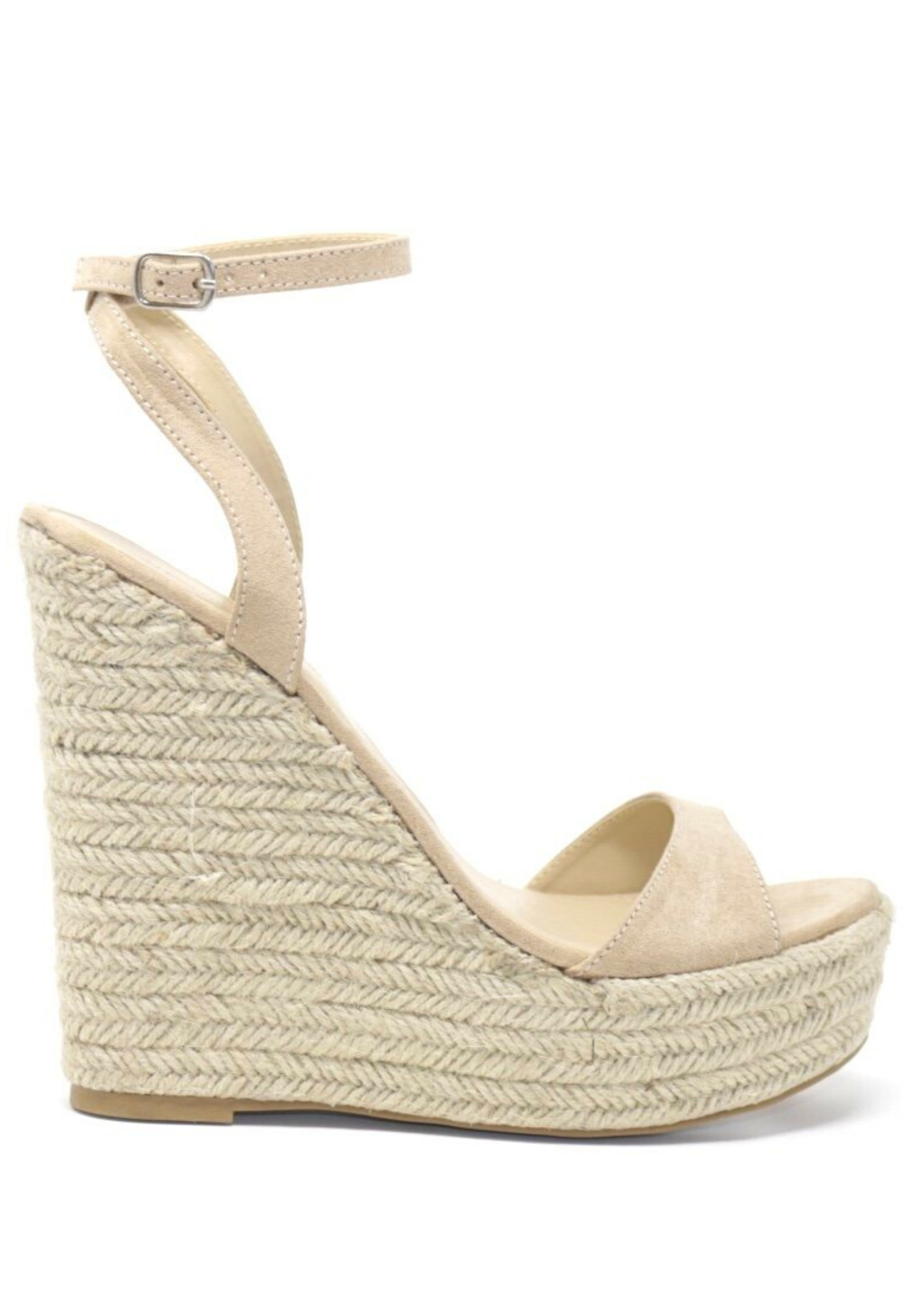 Nude suede ALYSSA wedge with espadrille wedge that crisscross strap that crosses in the back as the buckle buckles in the side that is silver. Thick to thin back to thick strap in the front.