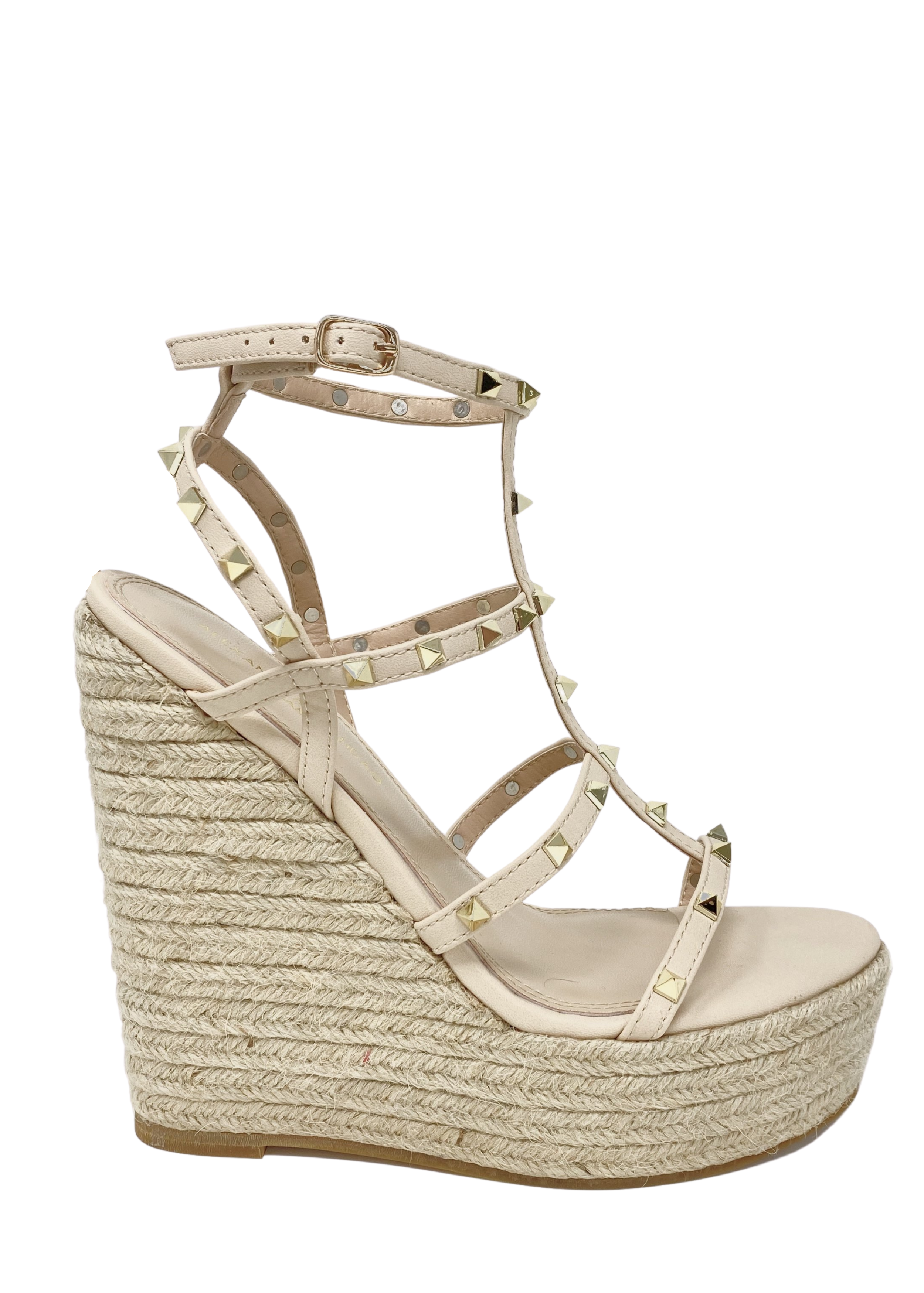 Astrid Espadrille Wedges in Nude that has a espadrille wedge and multi strap gold studded wedge. 