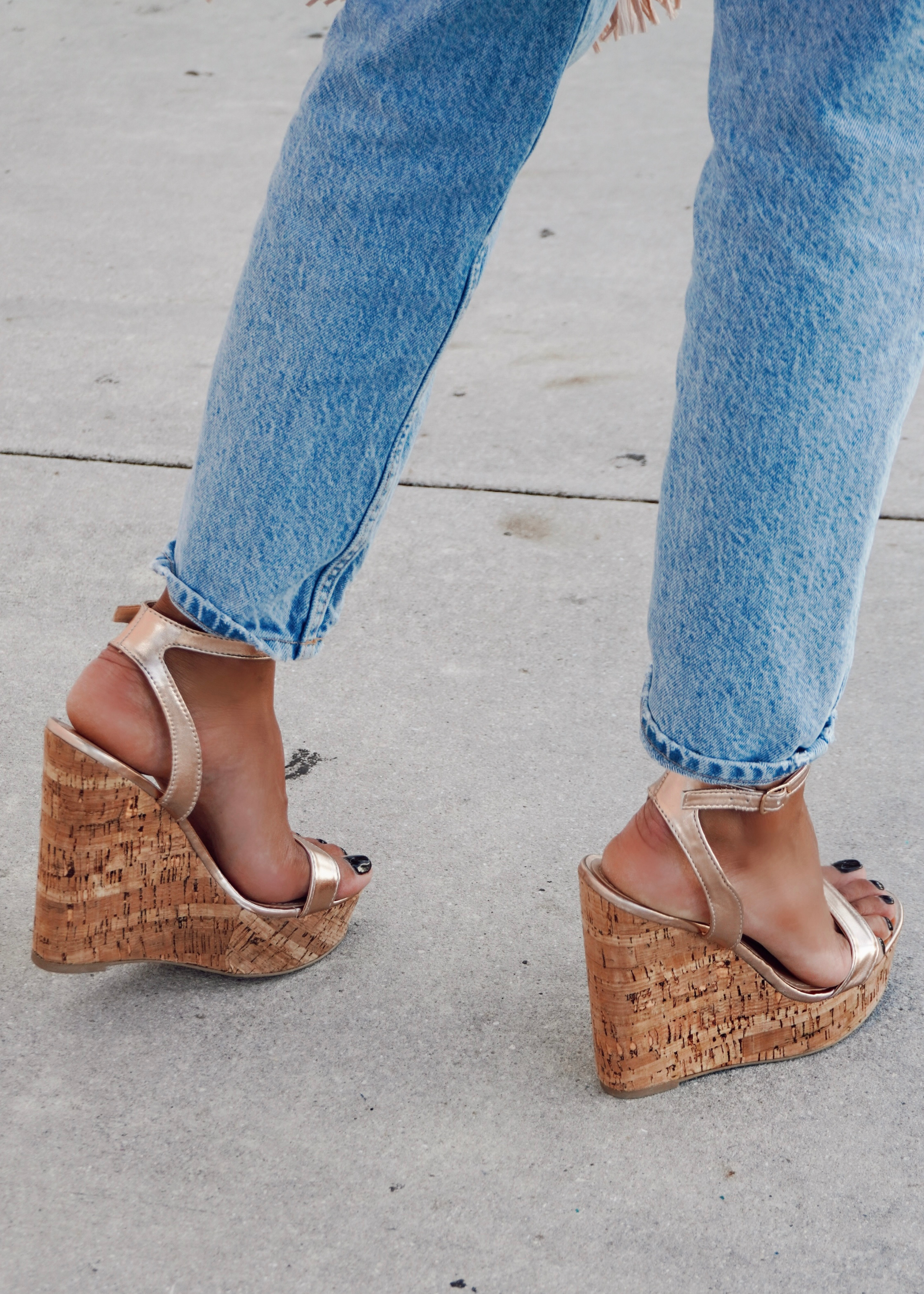 Women's wedge heels in rose gold.