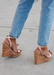 Women's wedge heels in rose gold.