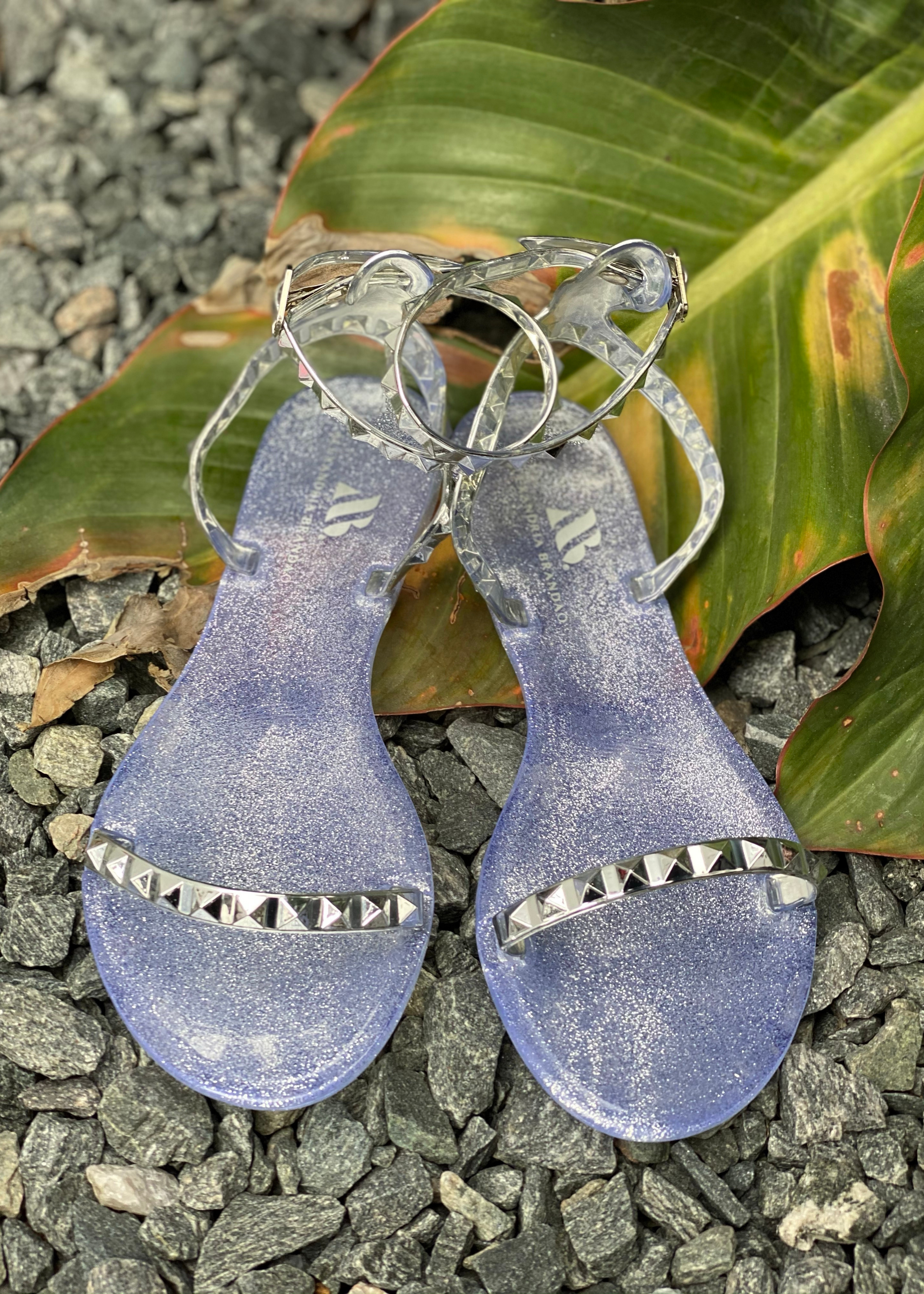 Aria Women's silver waterproof jelly sandal.