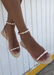 Women's Rose gold jelly sandals with glittery rose gold clear soles. Women's Two strap women's rose gold sandals.  Side View
