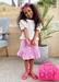  @honor_monroe wearing matching Girl kid's neon pink Aria jelly studded sandals studded with rigged strap in the front and on in the back around the ankle that buckles at ankle that matches women's neon pink jelly studded jelly waterproof Aria Sandals so that mom's and daughters can have matching shoes as their friendship bracelet by Alexandria Brandao Shoes.