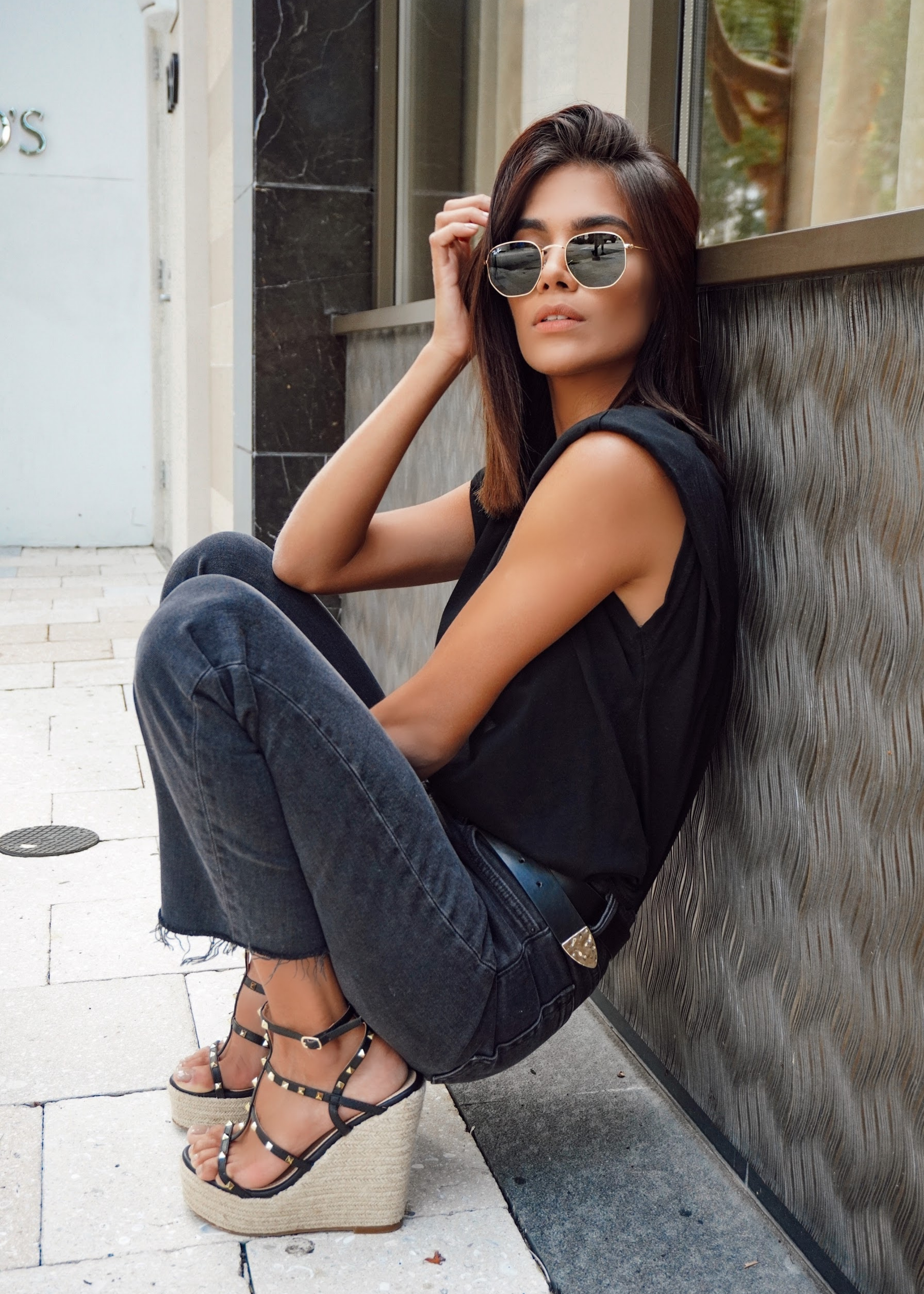@carlanunez_ dressed up her casual afternoon look with our Astrid studded  platform wedges in black.