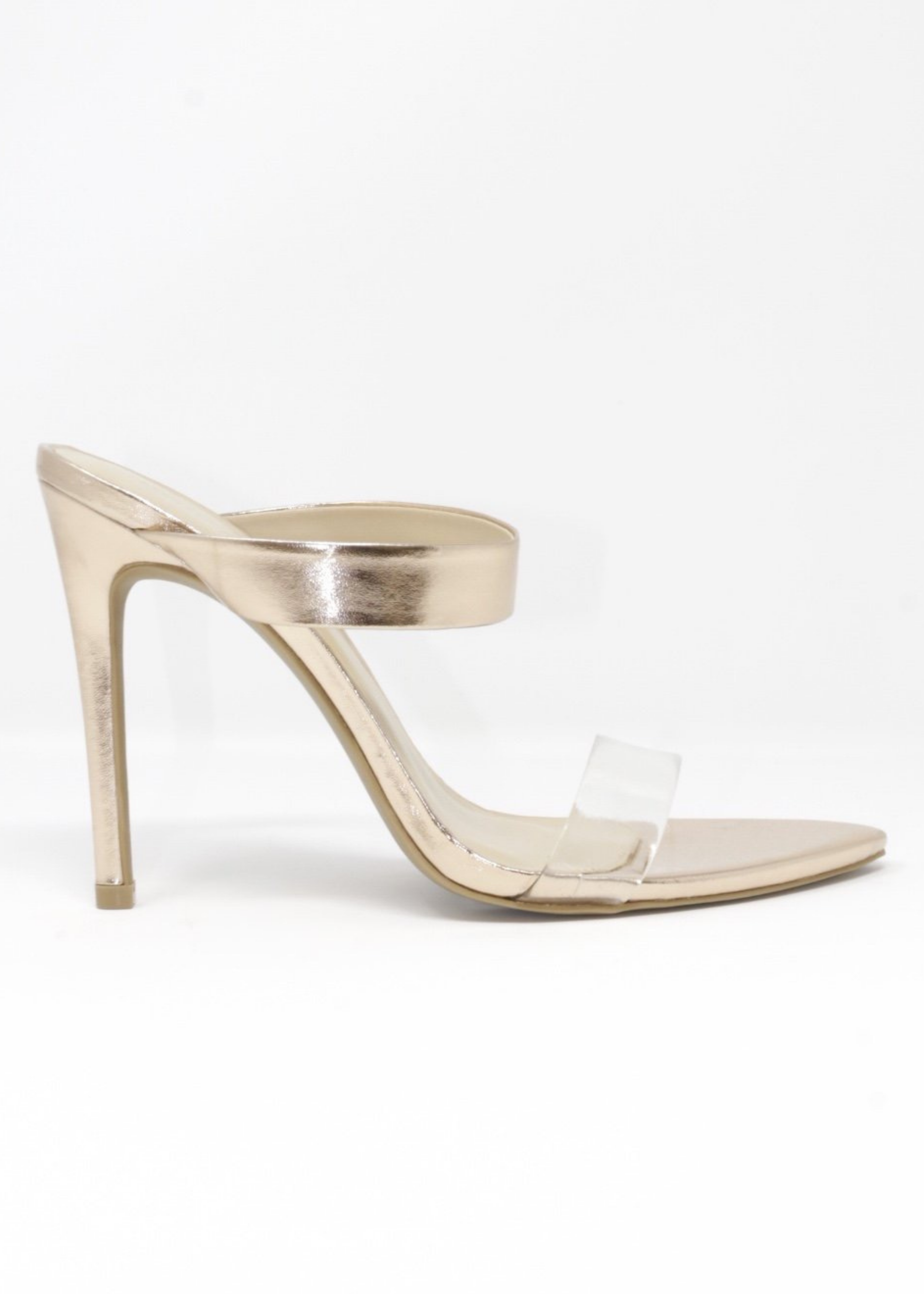 Audrey Heels with Clear Strap in RoseGold.  Audrey Heels with Clear Strap in front where the feet are and rose gold strap  on the bridge of foot. Has a point sole and you slip it on and off.  The back is always showing and free. side view in white background