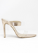 Audrey Heels with Clear Strap in RoseGold.  Audrey Heels with Clear Strap in front where the feet are and rose gold strap  on the bridge of foot. Has a point sole and you slip it on and off.  The back is always showing and free. side view in white background