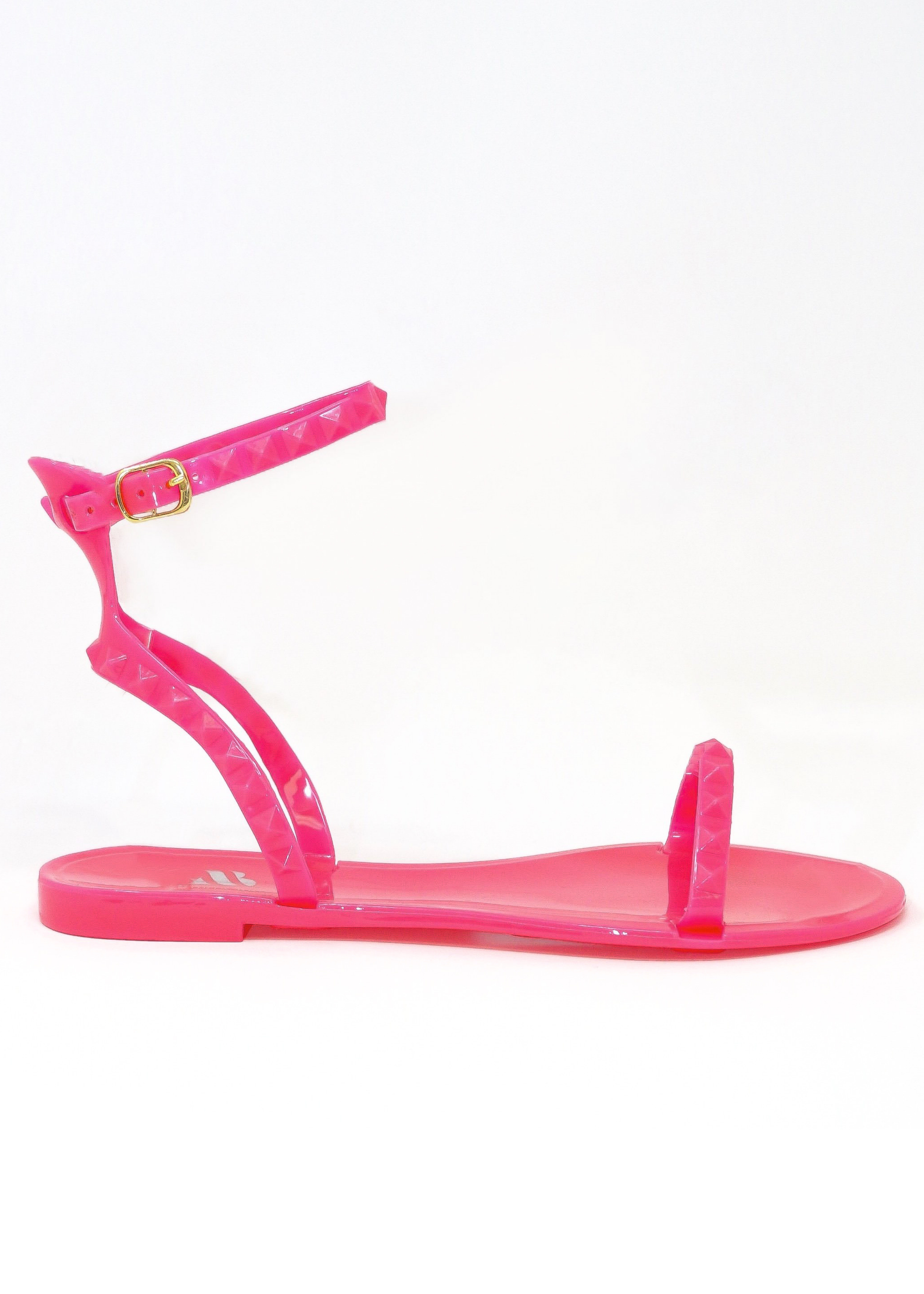 Women's neon pink waterproof jelly sandals for everyday outfits and pool days. Side view