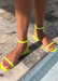 Aria Neon yellow water proof sandals by the pool.